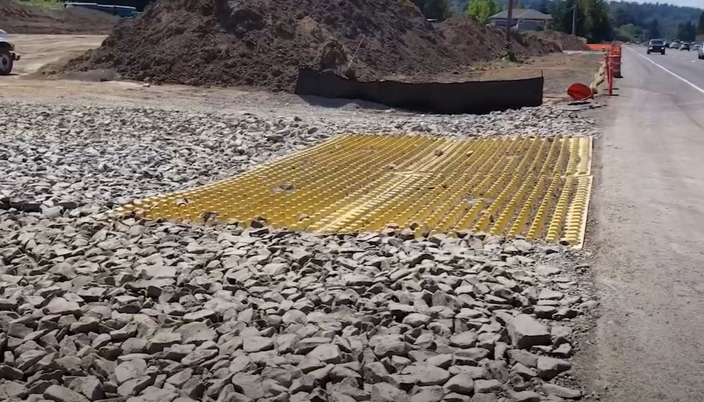 example stabilized construction entrance using jagged rocks and a proprietary rumble strip
