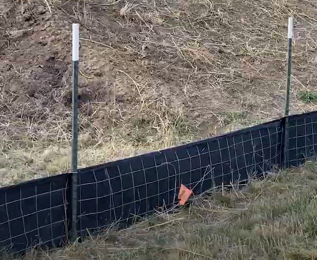 low profile, reinforced silt fence attached to T posts